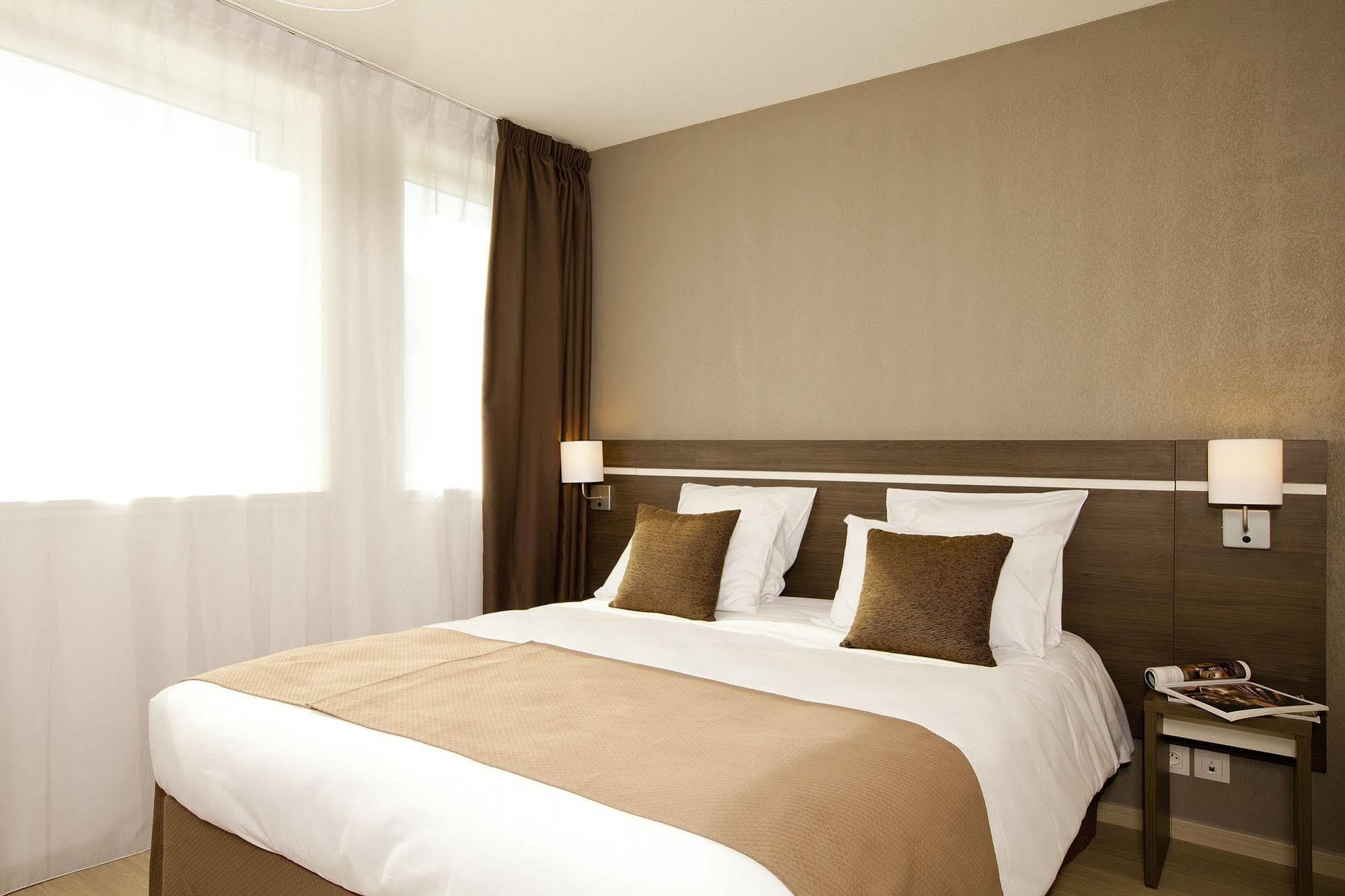 Sejours & Affaires Massy Atlantis Aparthotel Exterior photo